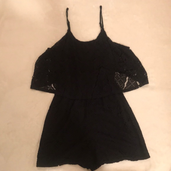 I am selling a black romper, with a fabric design - Picture 1 of 2